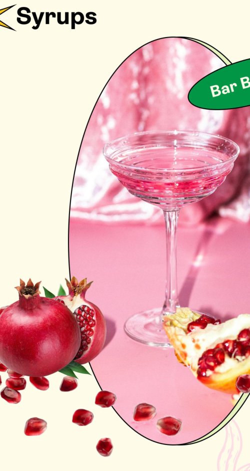 Pink pomegranate cocktail in a coupe glass