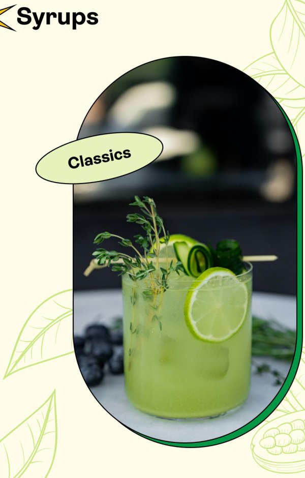 Green herb cocktail garnished with lime and rosemary